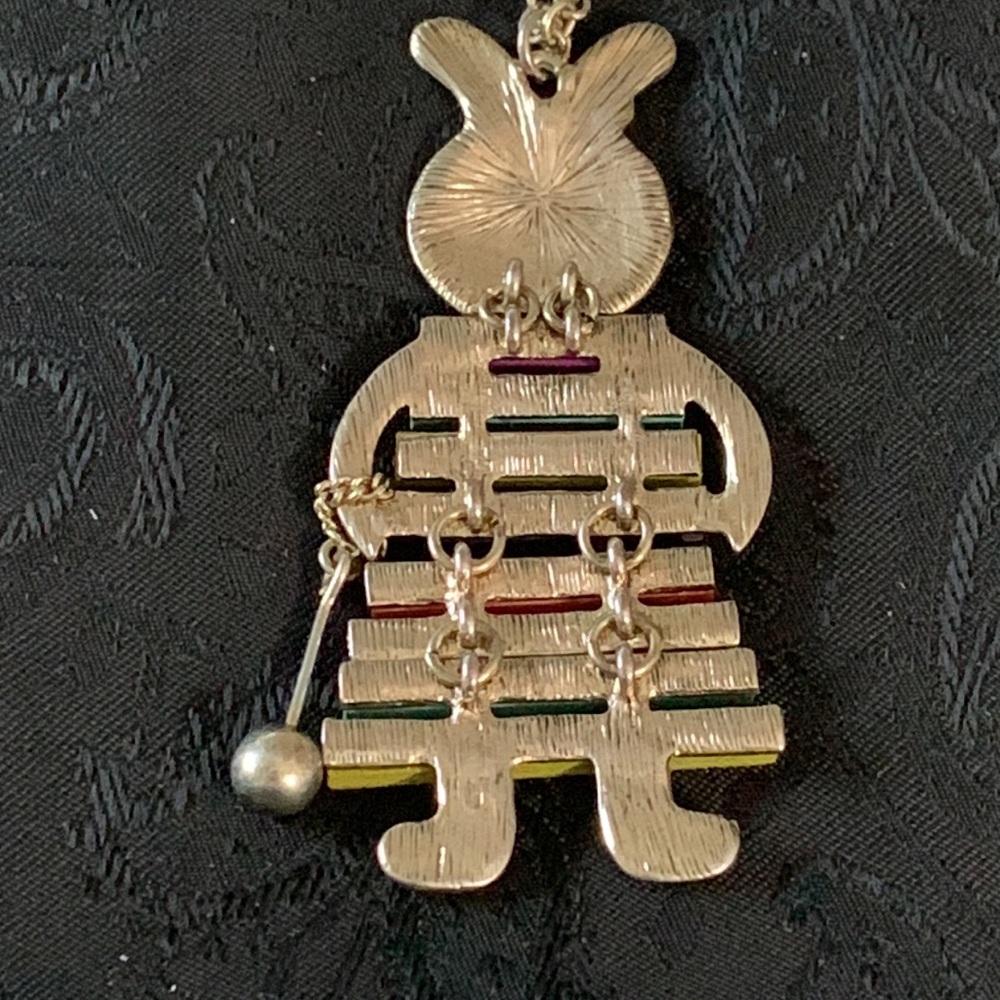 This Necklace Features an Enameled Rabbit Playing a Wooden Colorful Xylophone - Picture 2 of 6